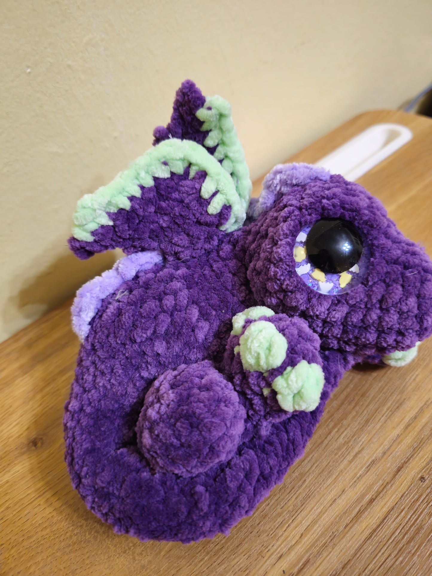 Purple and green baby dragon