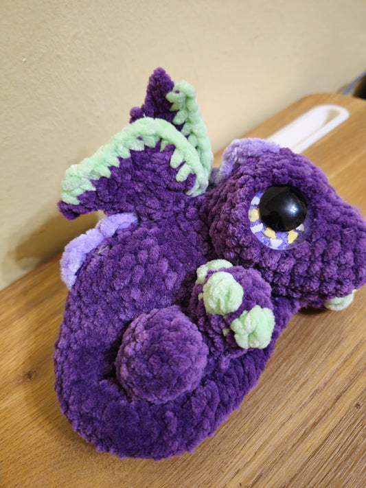 Purple and green baby dragon