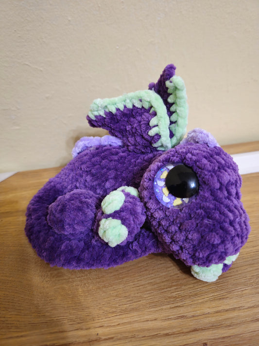 Purple and green baby dragon